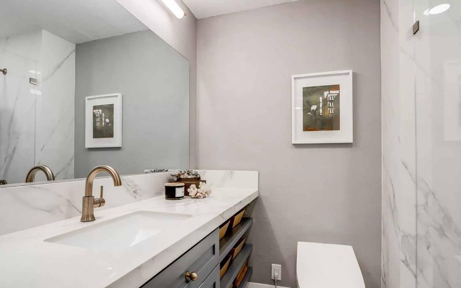 Kitchen and bath remodeling in Los Gatos displaying traditional vanity with marble countertops and classic wood cabinetry