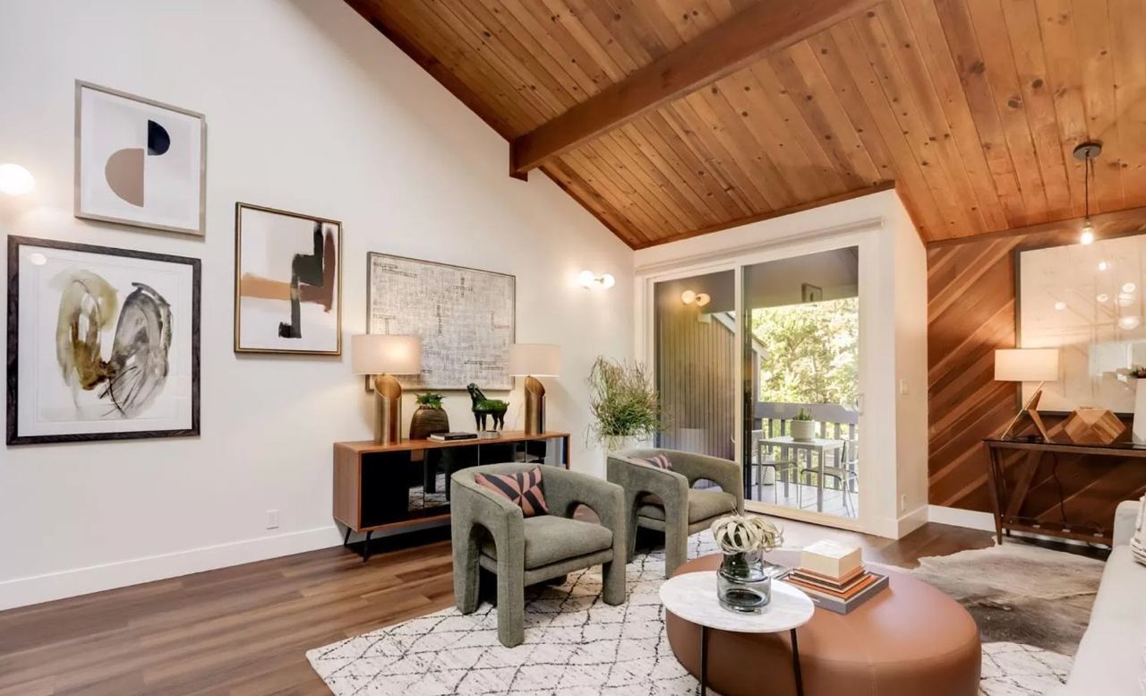 Stunning whole home remodel Los Gatos living space featuring dramatic vaulted wood ceiling with exposed beams