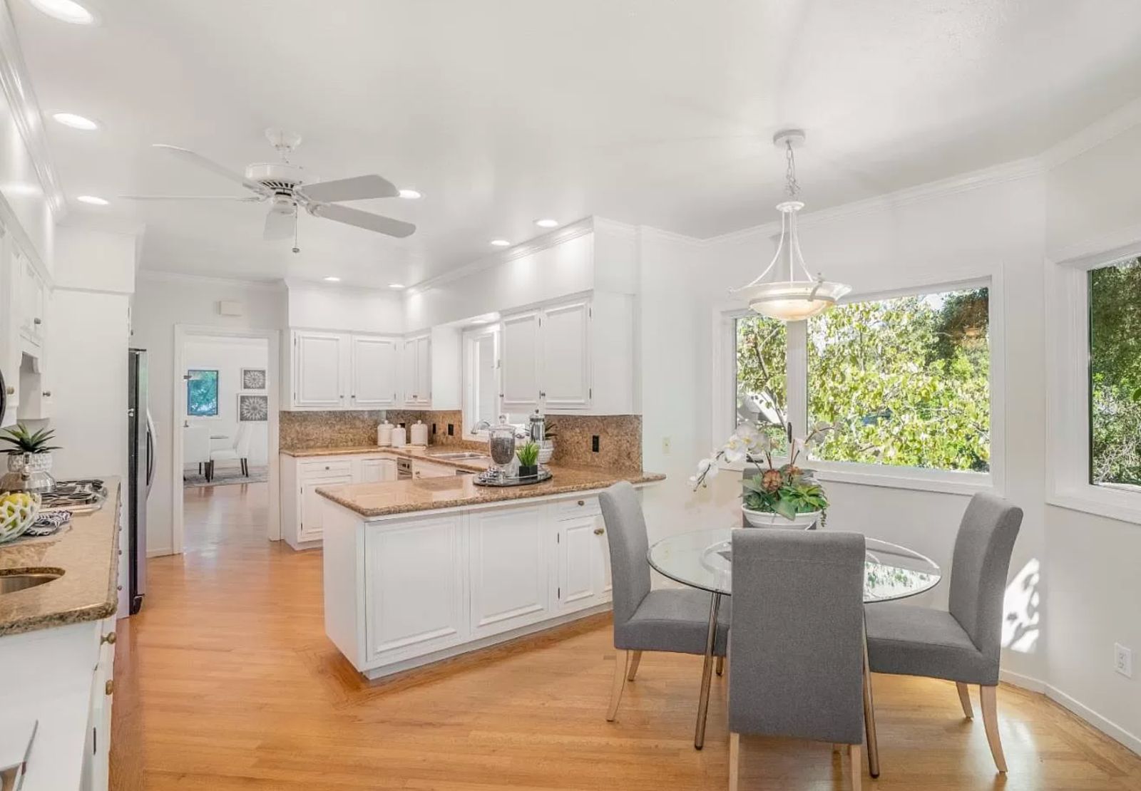 Before photo of Vista Del Mar home remodel showing original kitchen and living area layout prior to open concept transformation by ASL Remodeling in Los Gatos