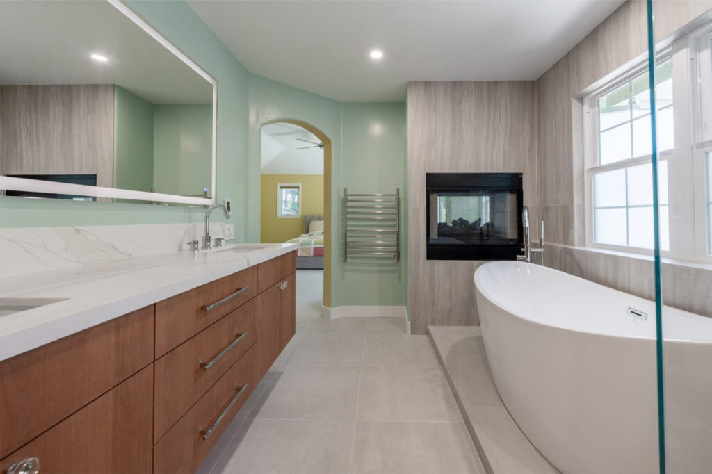 Second story addition cost in San Jose includes modern bathroom with floating vanity and designer tile work