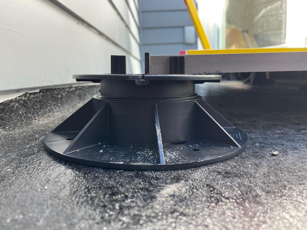 Detail of Vista Del Mar home remodel showing CIM 1000 waterproofing membrane installation before floating tile system application by ASL Remodeling in Los Gatos